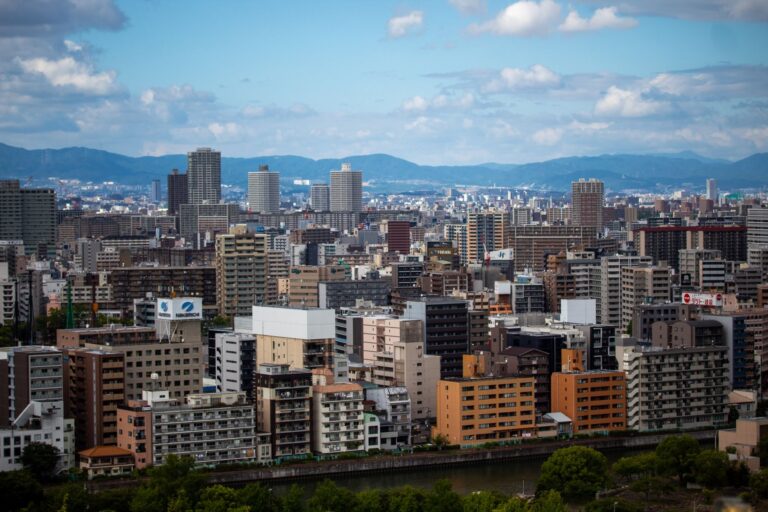 Explore the vibrant cityscape of Osaka, Japan, with this breathtaking aerial view showcasing its modern architecture and
