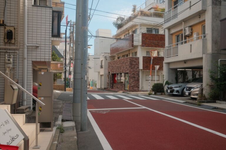 A peaceful street scene in Shinjuku City, Tokyo, Japan with modern architecture.